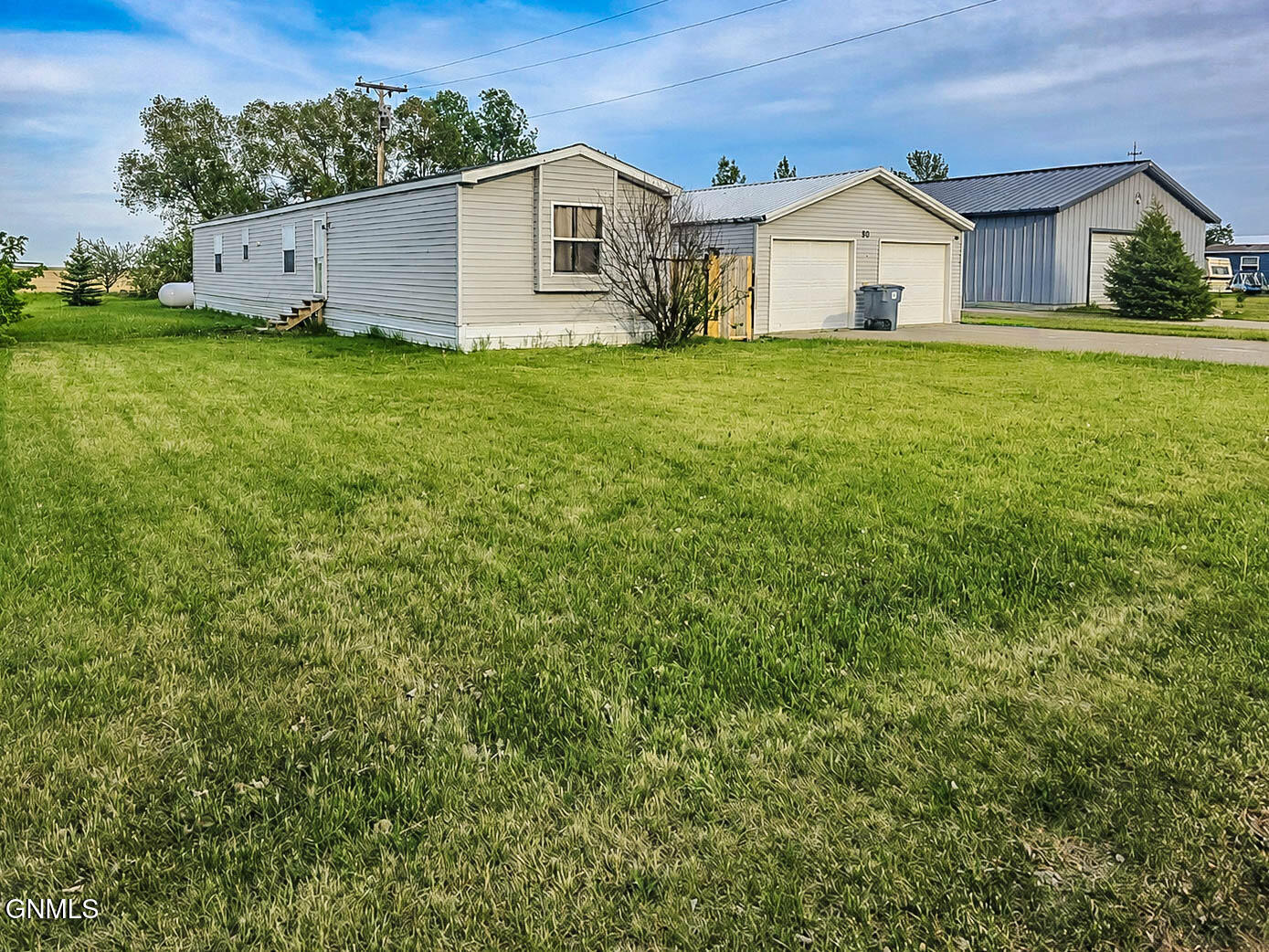 Photo 1 of 69 — 90 1st Street E, Coleharbor, ND 58531