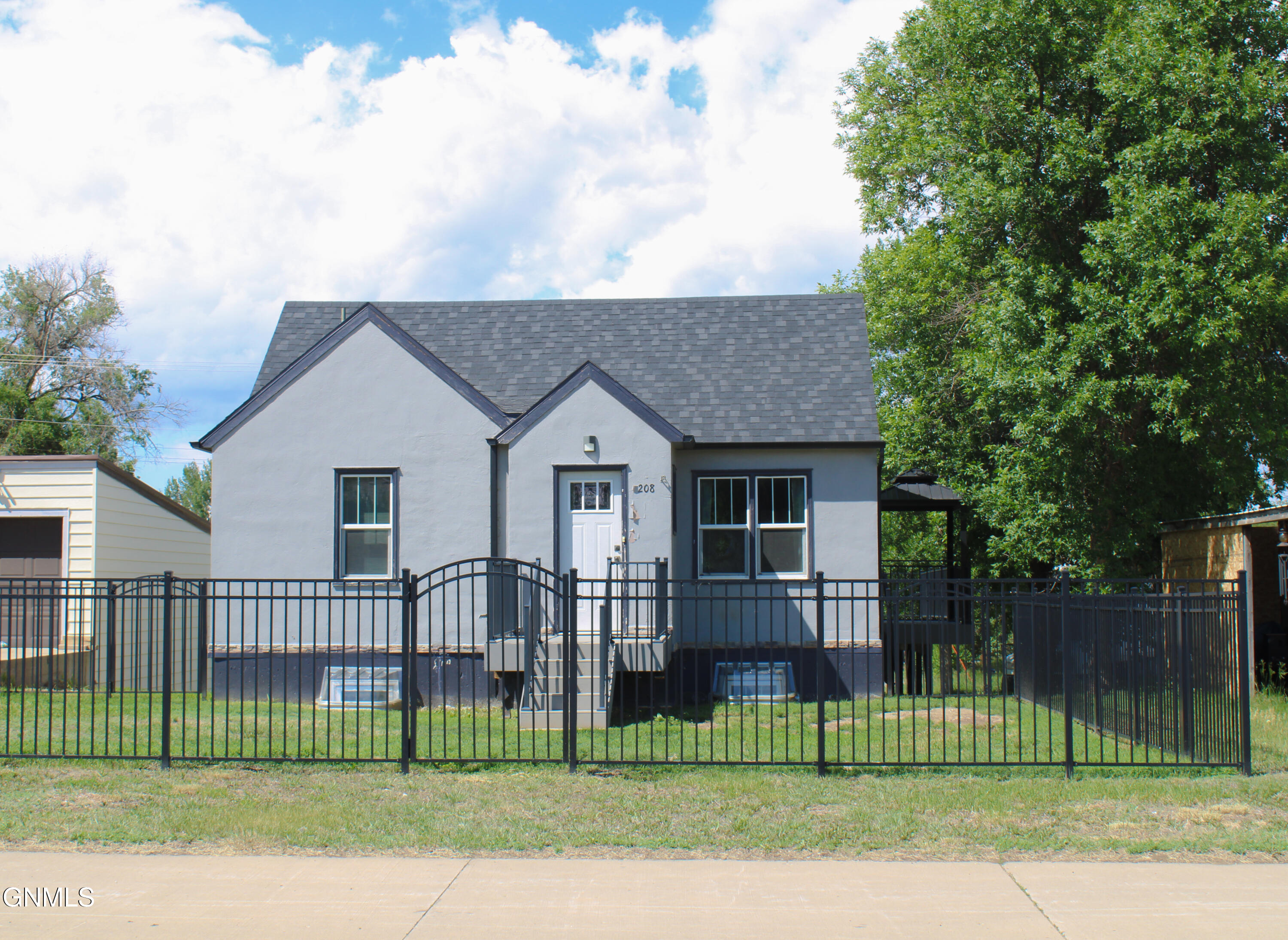 Photo 1 of 30 — 208 4th Avenue NE, Watford City, ND 58854