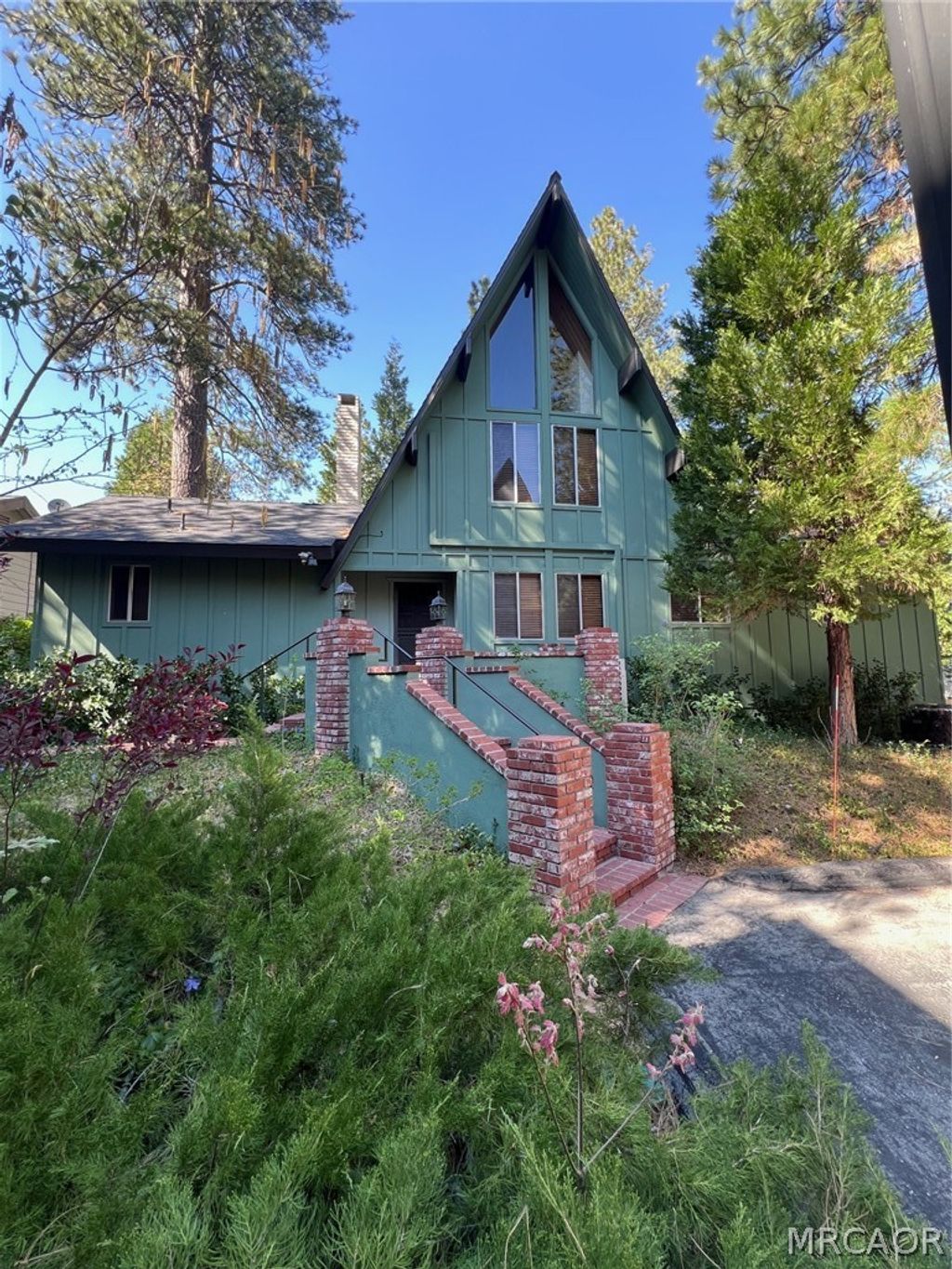 Photo of 180 Grass Valley Road #42, Blue Jay, CA 92317 (MLS # 32600733)