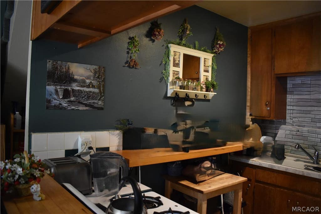 Photo of 1028 W Rainbow Boulevard, Big Bear City, CA 92314 (MLS # 32601652)
