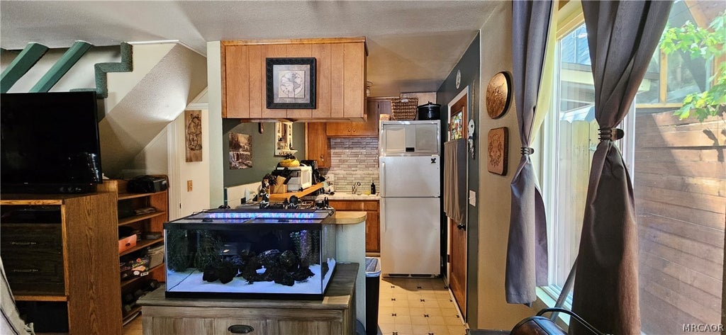 Photo of 1028 W Rainbow Boulevard, Big Bear City, CA 92314 (MLS # 32601652)