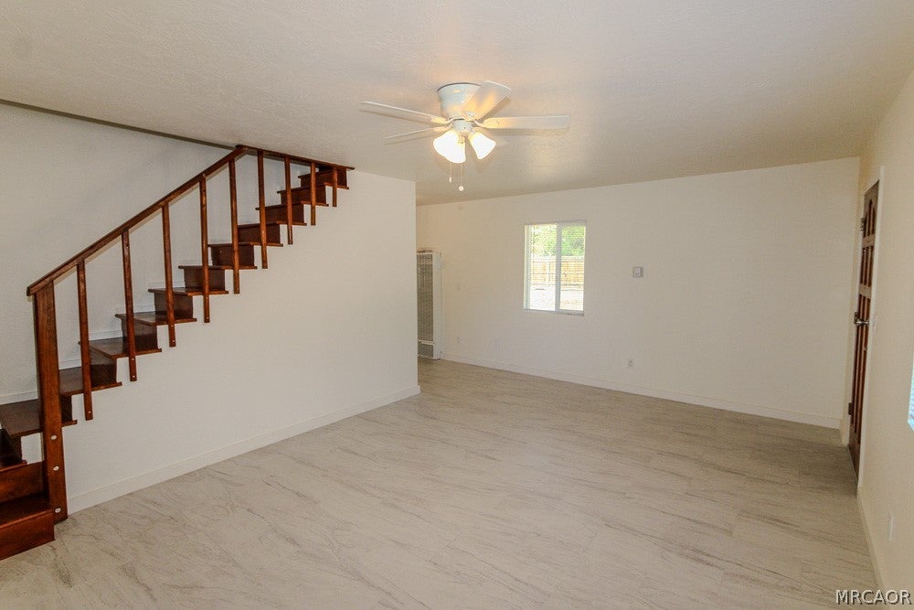 Photo of 328 E Tiger Lily Drive, Big Bear City, CA 92314 (MLS # 32602042)