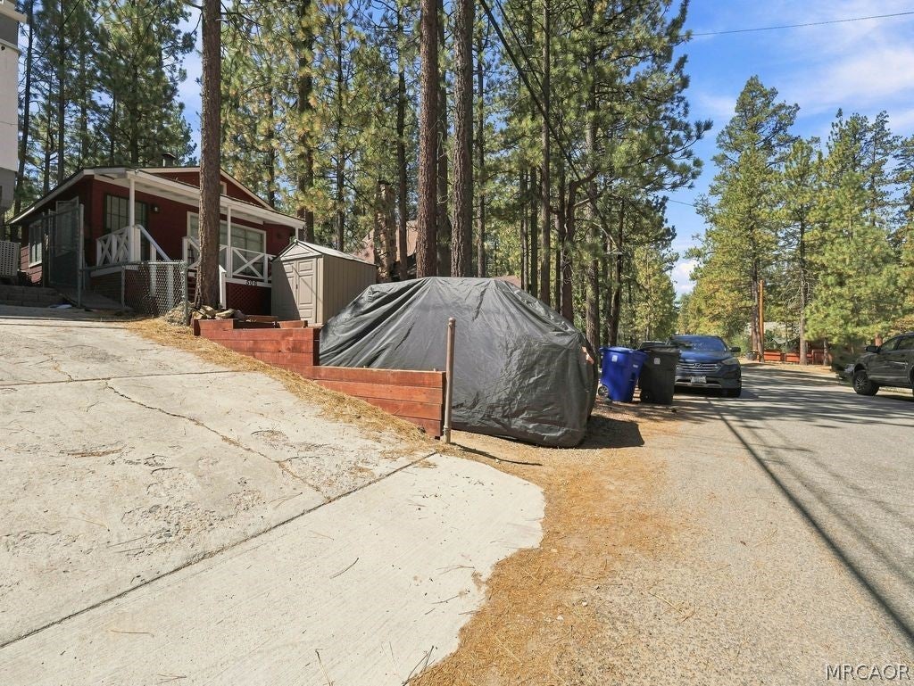 Photo of 506 W Rainbow Boulevard, Big Bear City, CA 92314 (MLS # 32601999)