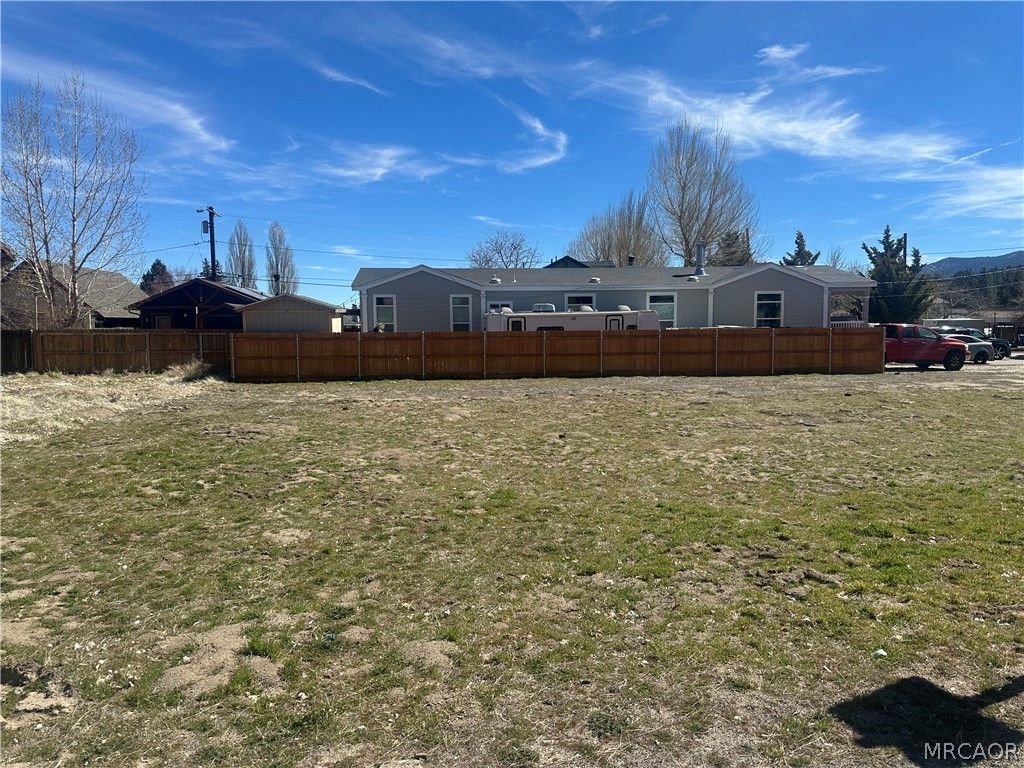 Photo of 900 Greenway Drive, Big Bear City, CA 92314 (MLS # 32600680)