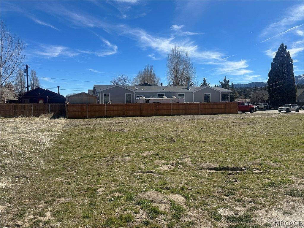 Photo of 900 Greenway Drive, Big Bear City, CA 92314 (MLS # 32600680)