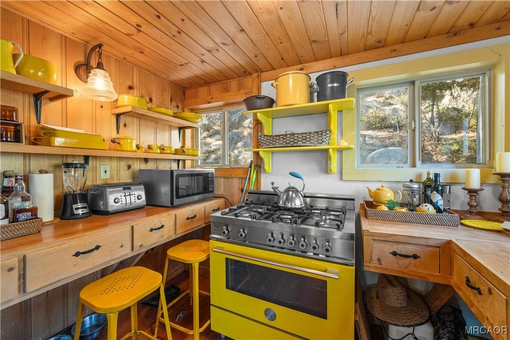 Photo of 305 North Shore Drive, Fawnskin, CA 92333 (MLS # 32502786)