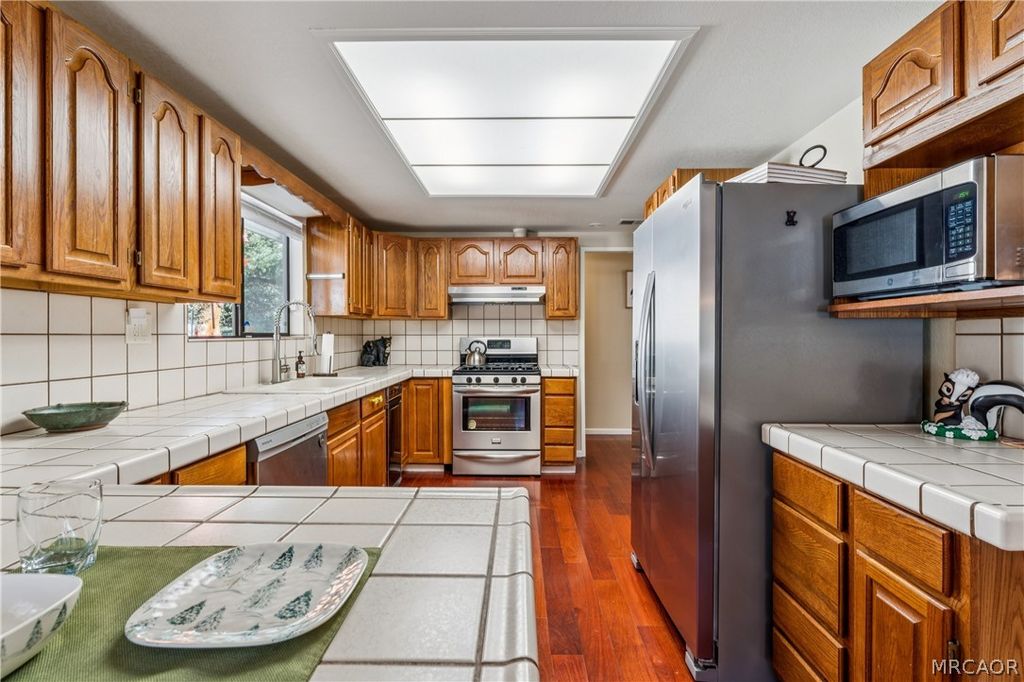 Photo of 25089 Moon Drive, Crestline, CA 92325 (MLS # 32600249)