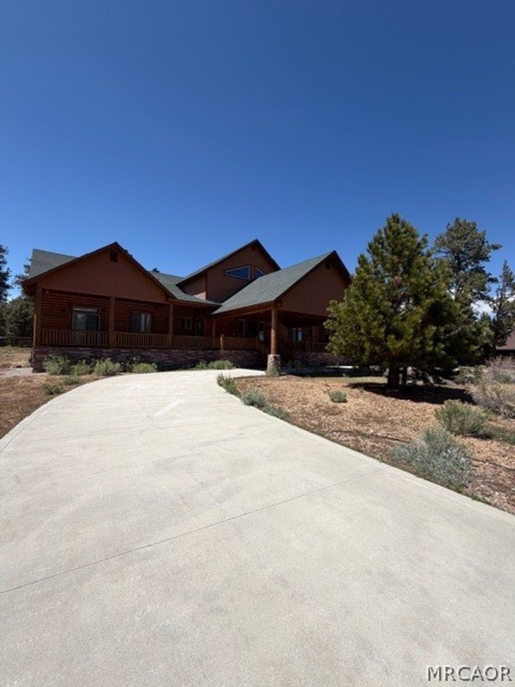 Photo of 1099 Heritage Trail, Big Bear City, CA 92314 (MLS # 32600924)
