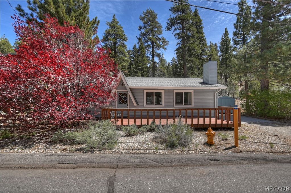 Photo of 1099 Canyon Road, Fawnskin, CA 92333 (MLS # 32600893)