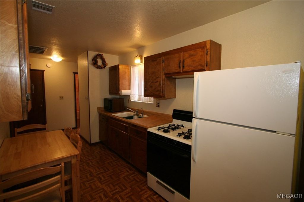Photo of 441 W Aeroplane Boulevard, Big Bear City, CA 92314 (MLS # 32502503)