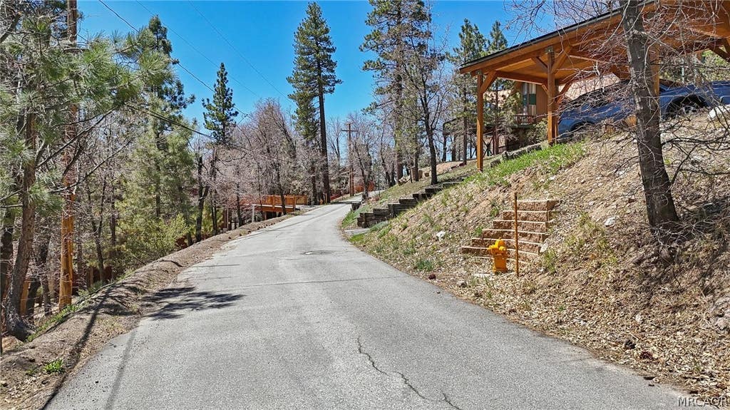 Photo of 1179 Ridge Road, Fawnskin, CA 92333 (MLS # 32601905)