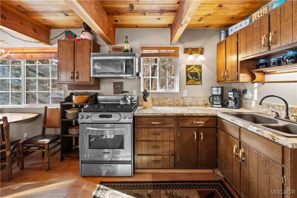 Photo of 1289 Canyon Road, Fawnskin, CA 92333 (MLS # 32502664)