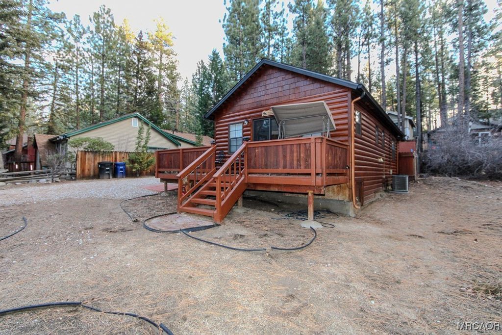 Photo of 404 W Rainbow Boulevard, Big Bear City, CA 92314 (MLS # 32600142)