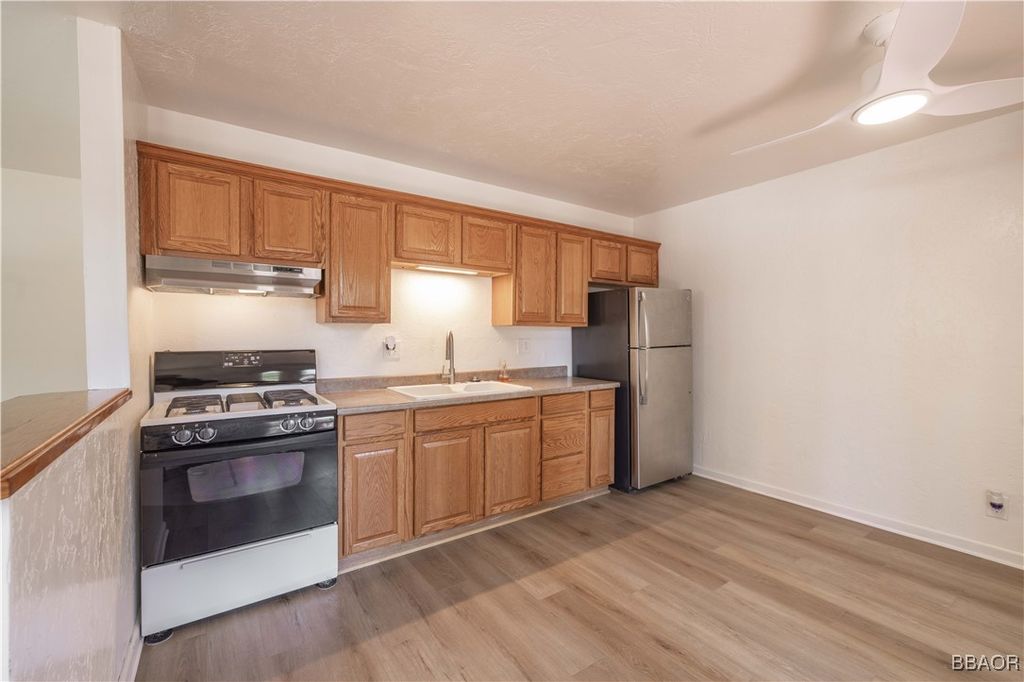 Photo of 1044 E Country Club Boulevard, Big Bear City, CA 92314 (MLS # 32501487)