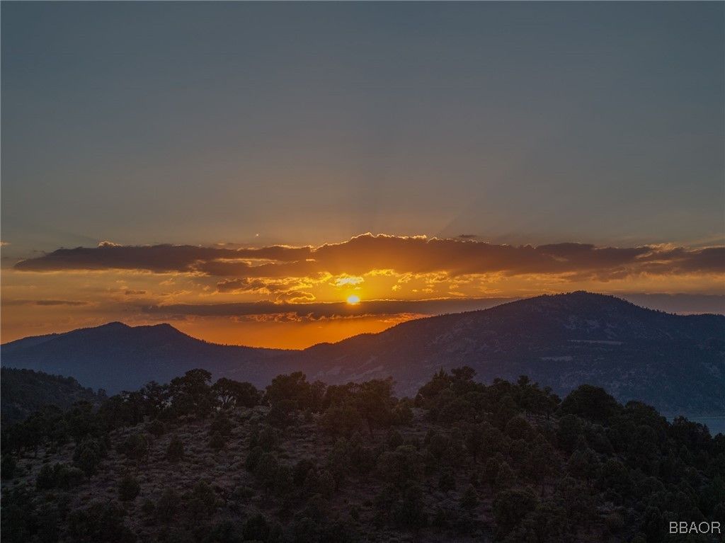 Photo of 550 Eagle Ridge Lane, Big Bear City, CA 92314 (MLS # 32502068)