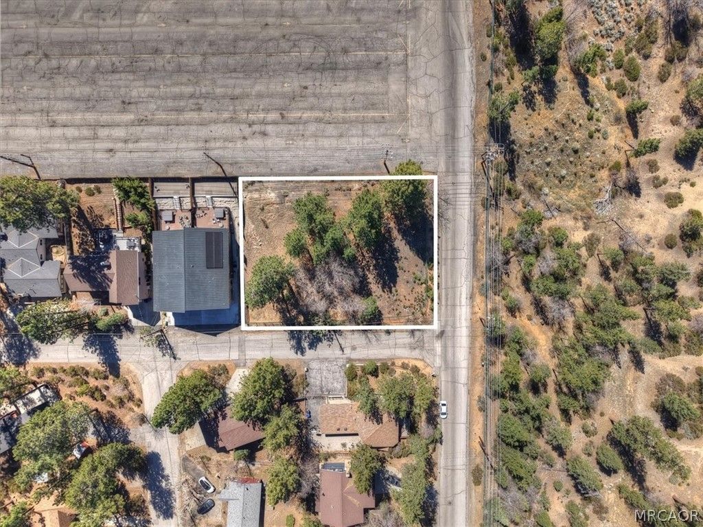 Photo of 41711 Switzerland Drive, Big Bear Lake, CA 92315 (MLS # 32600610)