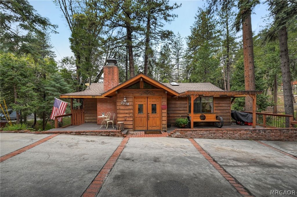 Photo of 2358 Rim Of The World Drive, Running Springs, CA 92382 (MLS # 32600928)