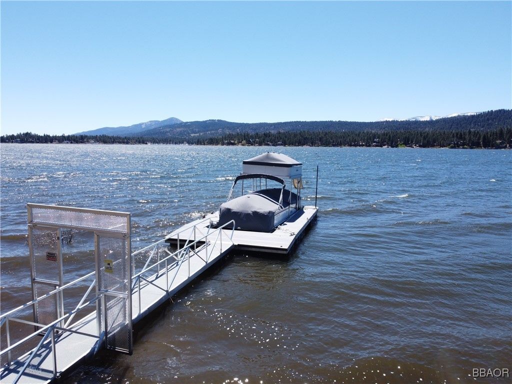 Photo of 38634 N Shore Drive, Fawnskin, CA 92333 (MLS # 32500842)