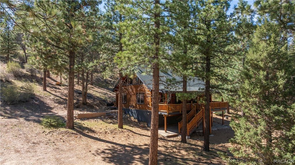 Photo of 384 Saw Mill Canyon Drive, Big Bear City, CA 92314 (MLS # 32600701)