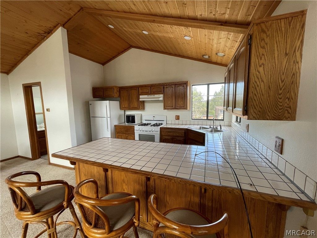 Photo of 2115 State Lane Lane, Big Bear City, CA 92314 (MLS # 32600491)