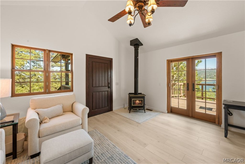 Photo of 338 North Shore Drive, Fawnskin, CA 92333 (MLS # 32601155)