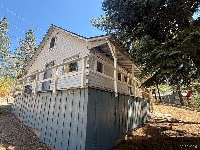 Photo of 33390 Wild Rose Drive, Green Valley Lake, CA 92341 (MLS # 32601975)