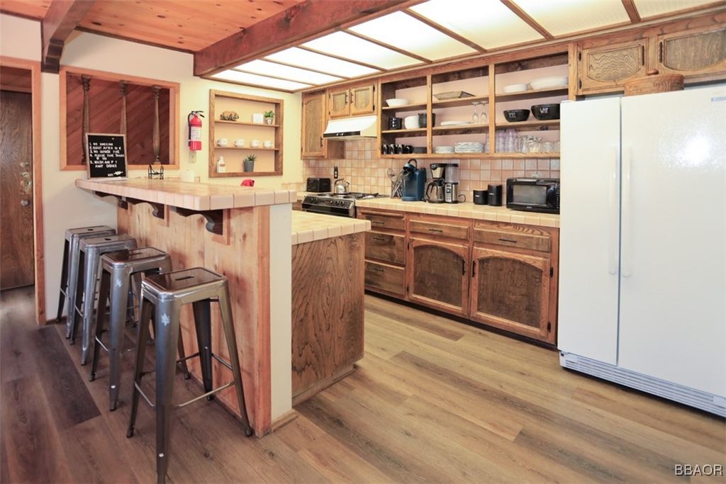 Photo of 1201 Fox Farm Road, Big Bear City, CA 92314 (MLS # 32502115)