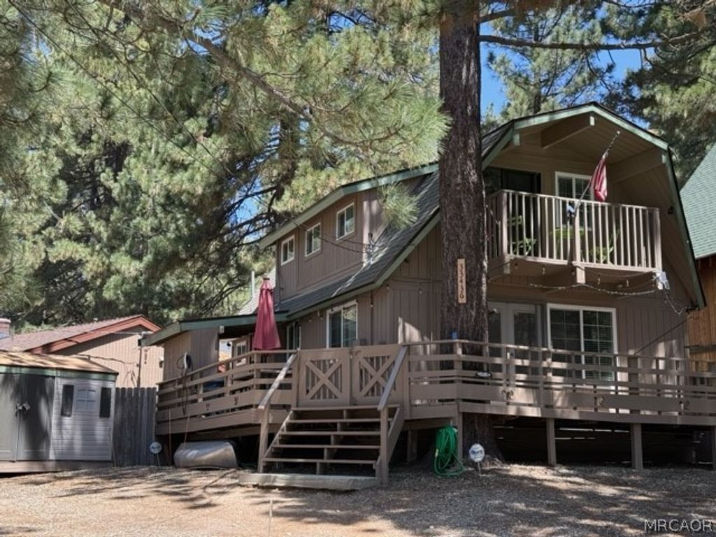 Photo of 33436 Bluebird Drive, Green Valley Lake, CA 92341 (MLS # 32600846)