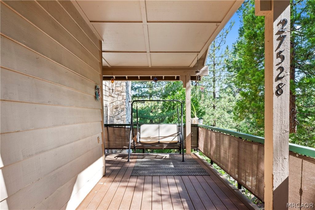 Photo of 27528 Ashwood Lane #27528, Lake Arrowhead, CA 92352 (MLS # 32600468)