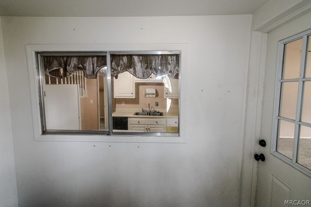 Photo of 870 Ash Lane, Big Bear City, CA 92314 (MLS # 32600985)