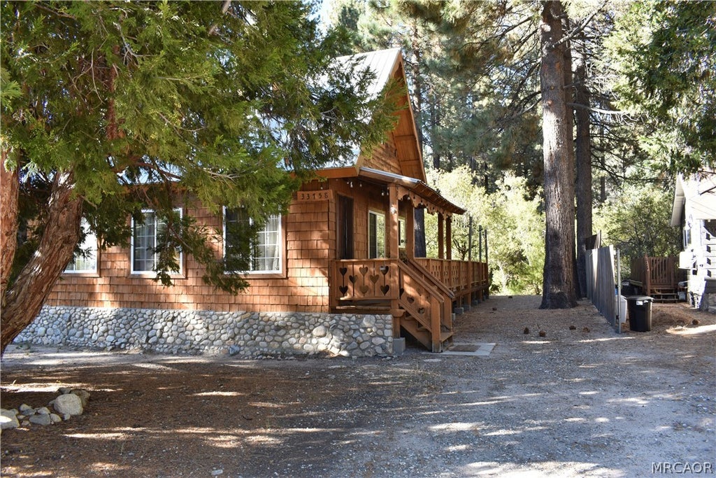 Photo of 33758 Meadow Lane, Green Valley Lake, CA 92341 (MLS # 32602352)