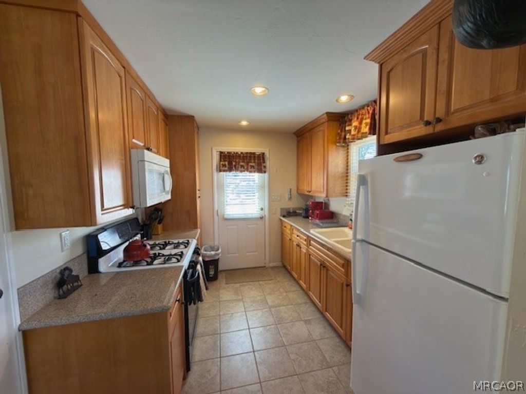 Photo of 32983 Canyon Drive, Green Valley Lake, CA 92341 (MLS # 32600789)
