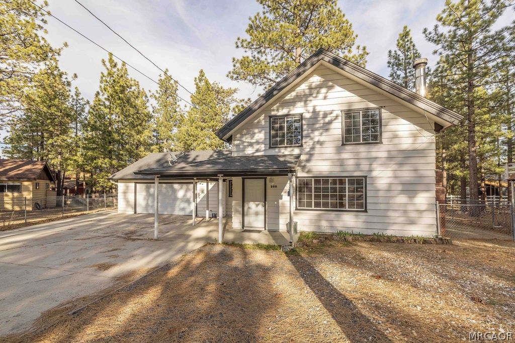 Photo of 300 Downey Drive, Big Bear City, CA 92314 (MLS # 32600534)