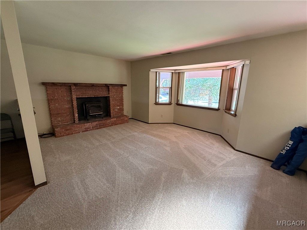 Photo of 411 E Fairway Boulevard, Big Bear City, CA 92314 (MLS # 32502391)