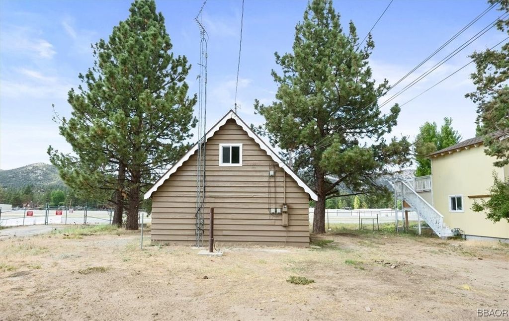 Photo of 345 W Fairway Boulevard, Big Bear City, CA 92314 (MLS # 32501830)