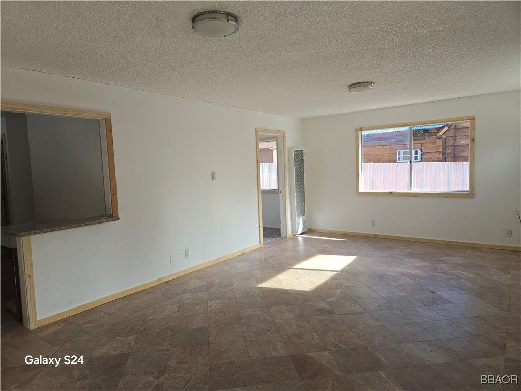Photo of 39210 N Shore Drive, Fawnskin, CA 92333 (MLS # 32406087)