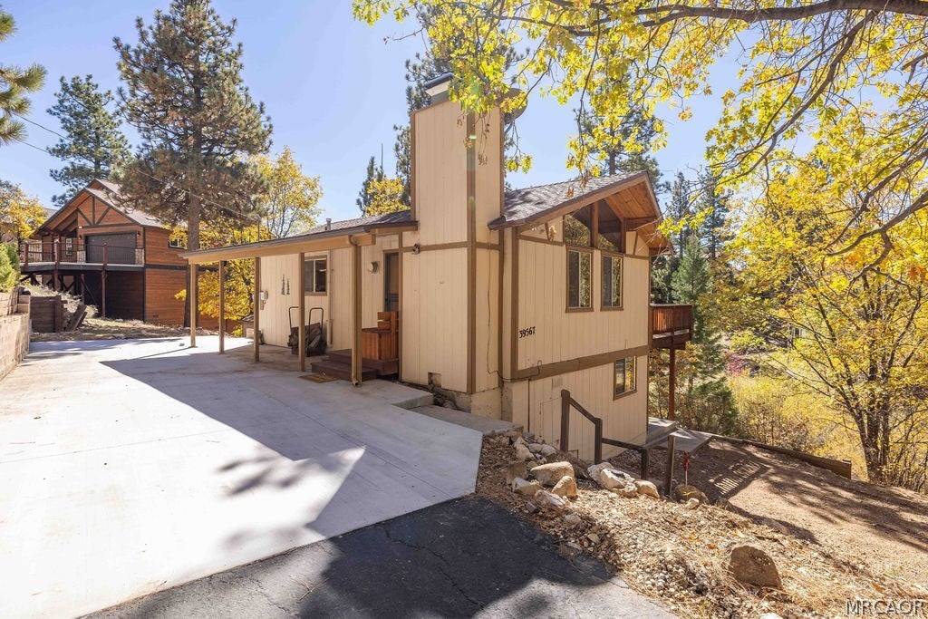Photo of 39567 Oak Glen Road, Fawnskin, CA 92333 (MLS # 32602529)