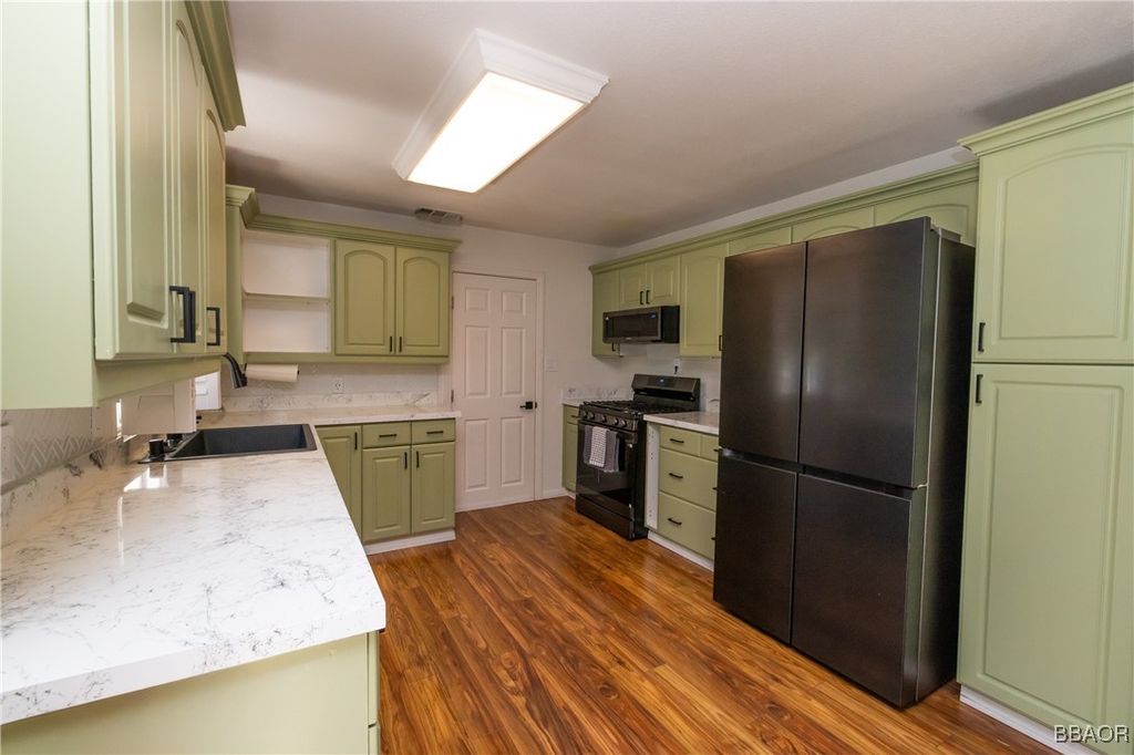 Photo of 31805 Luring Pines Drive, Running Springs, CA 92382 (MLS # 32502020)