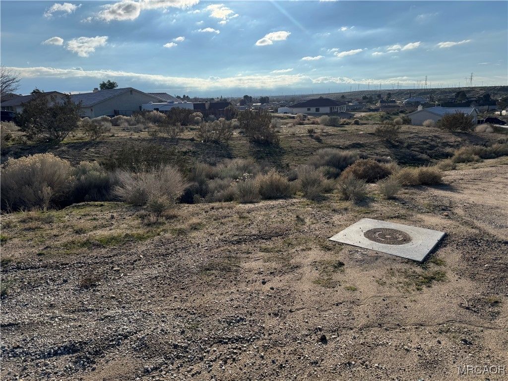 Photo of 0 Village Dr, Victorville, CA 92394 (MLS # 32600041)