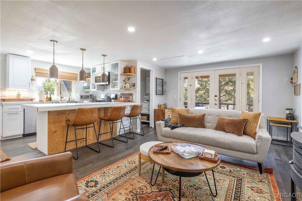 Photo of 39470 North Shore Drive, Fawnskin, CA 92333 (MLS # 32502520)