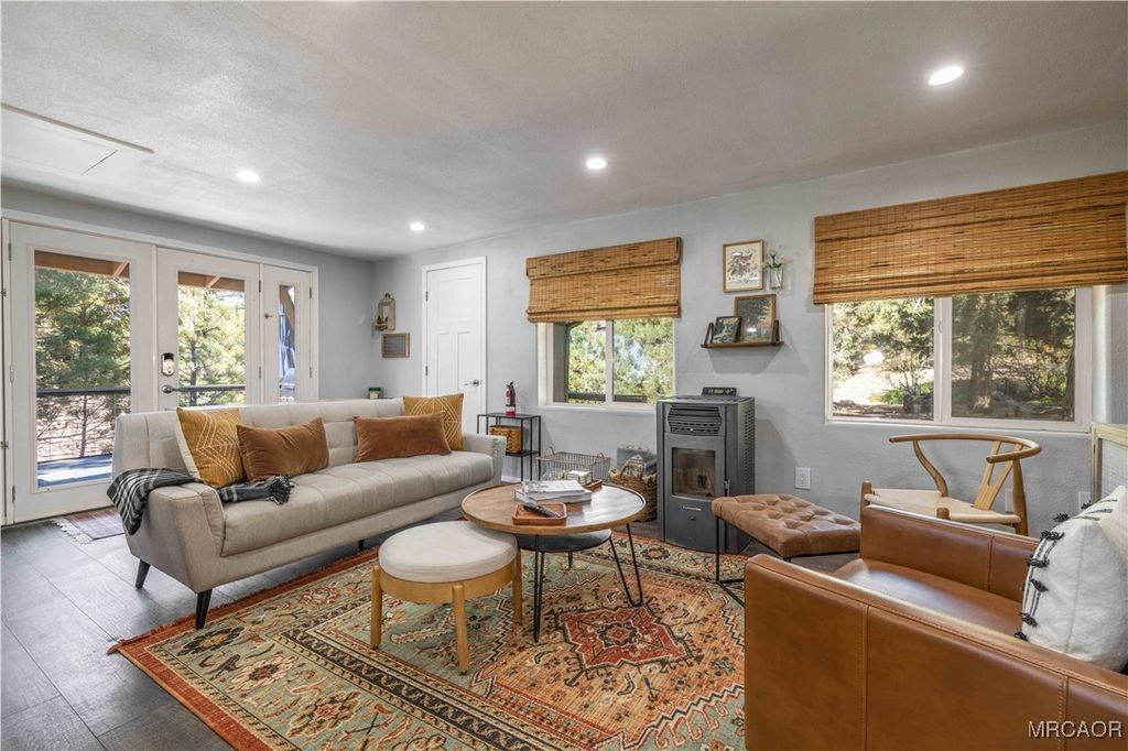 Photo of 39470 North Shore Drive, Fawnskin, CA 92333 (MLS # 32502520)