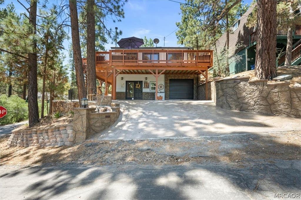 Photo of 300 Hilltop Lane, Big Bear City, CA 92314 (MLS # 32601766)