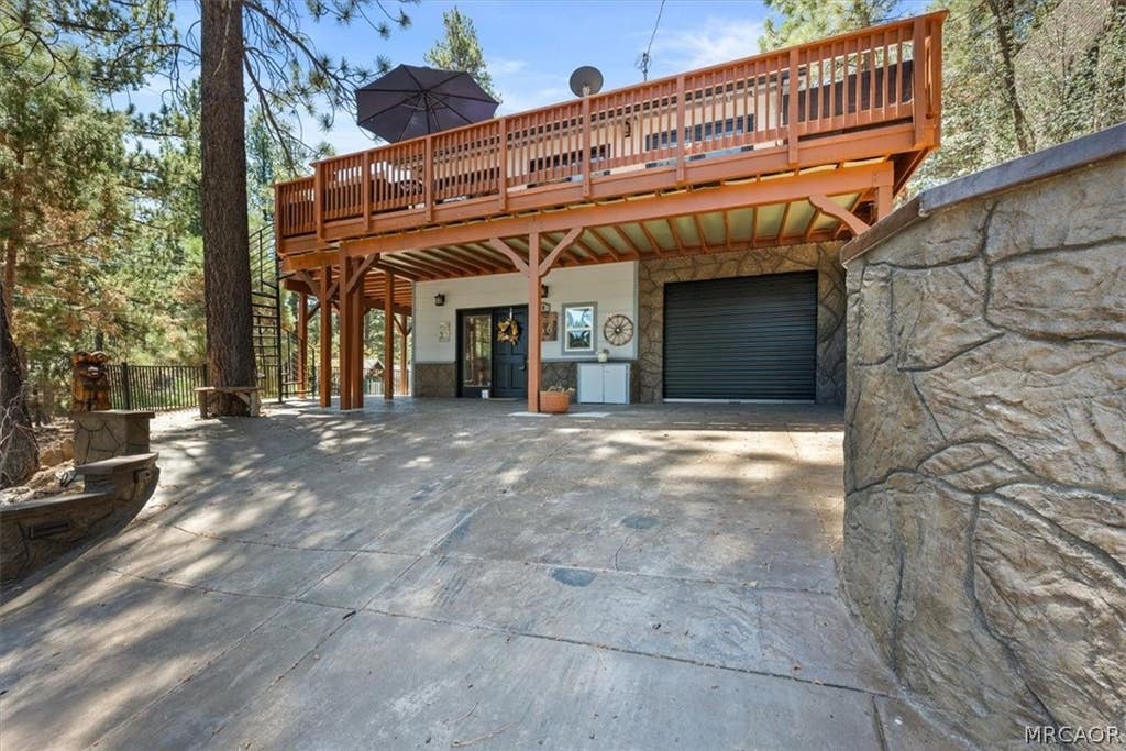 Photo of 300 Hilltop Lane, Big Bear City, CA 92314 (MLS # 32601766)