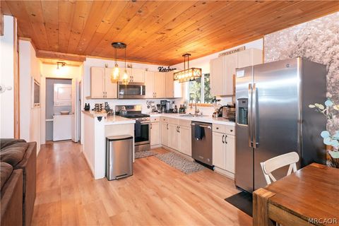 Photo of 108 E Rainbow Boulevard, Big Bear City, CA 92314 (MLS # 32600316)