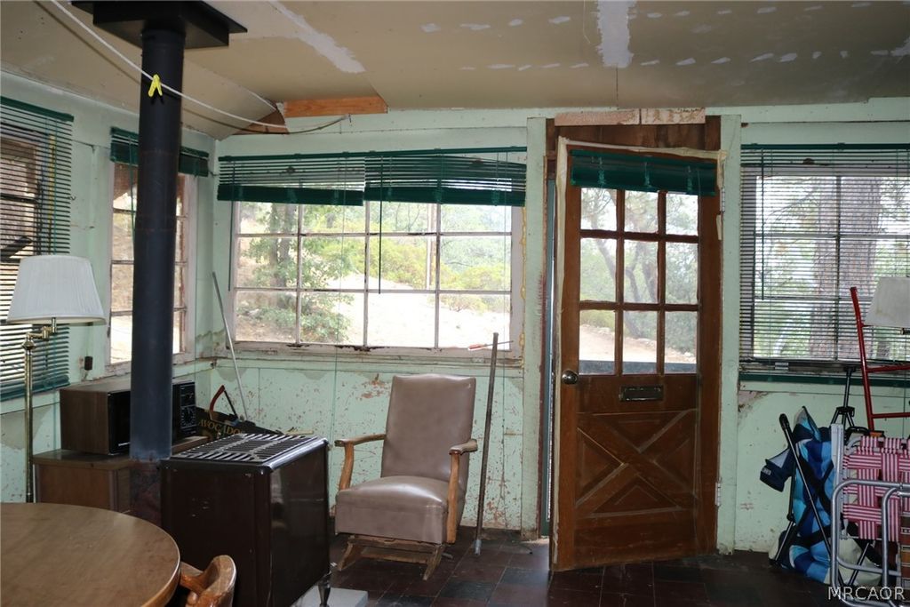 Photo of 281 Pine Oak Lane, Fawnskin, CA 92315 (MLS # 32601579)