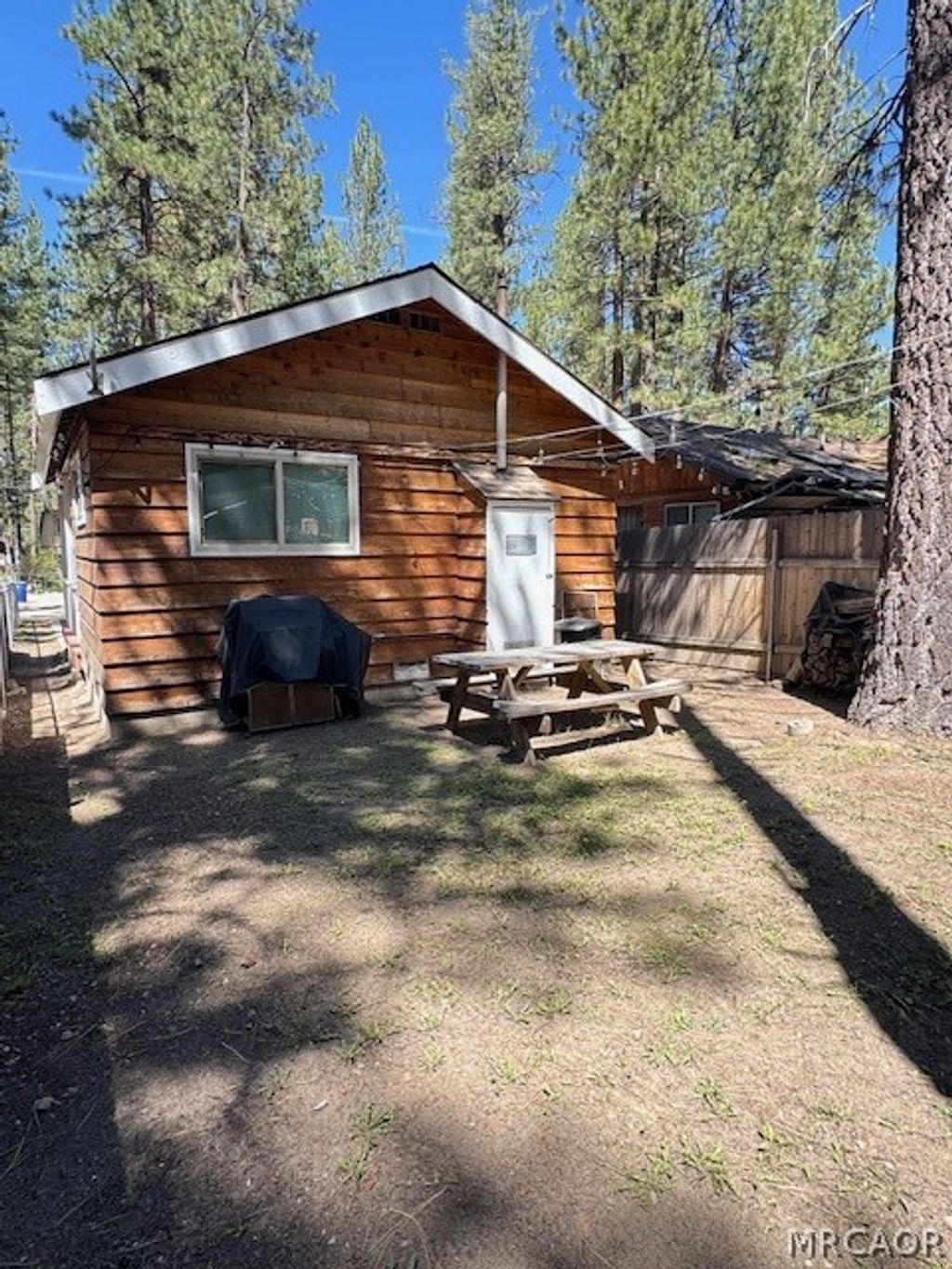 Photo of 816 W Rainbow Boulevard, Big Bear City, CA 92314 (MLS # 32600767)