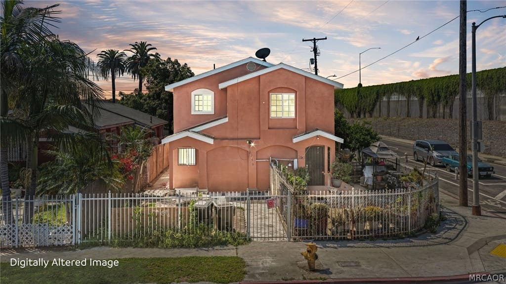 Photo of 348 W 83rd Street, Los Angeles, CA 90003 (MLS # 32601147)