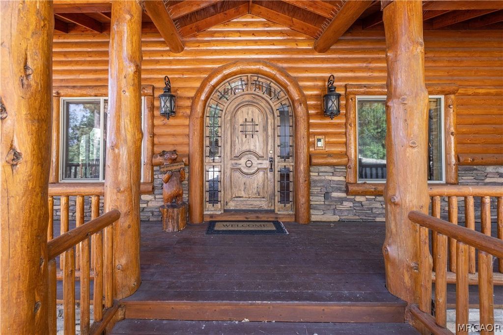 Photo of 39737 Flicker Road, Fawnskin, CA 92333 (MLS # 32600394)