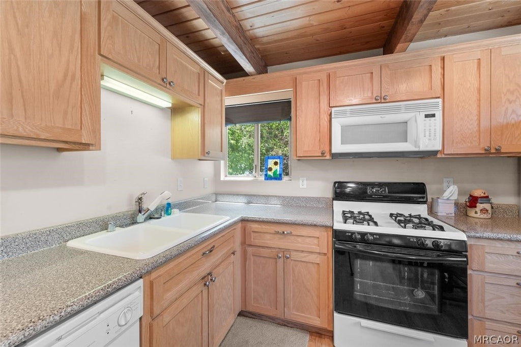 Photo of 205 W Fairway Boulevard, Big Bear City, CA 92314 (MLS # 32601760)