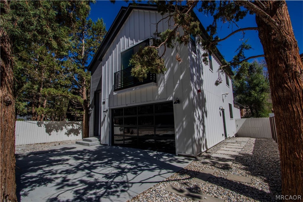 Photo of 305 E Angeles Boulevard, Big Bear City, CA 92314 (MLS # 32602021)